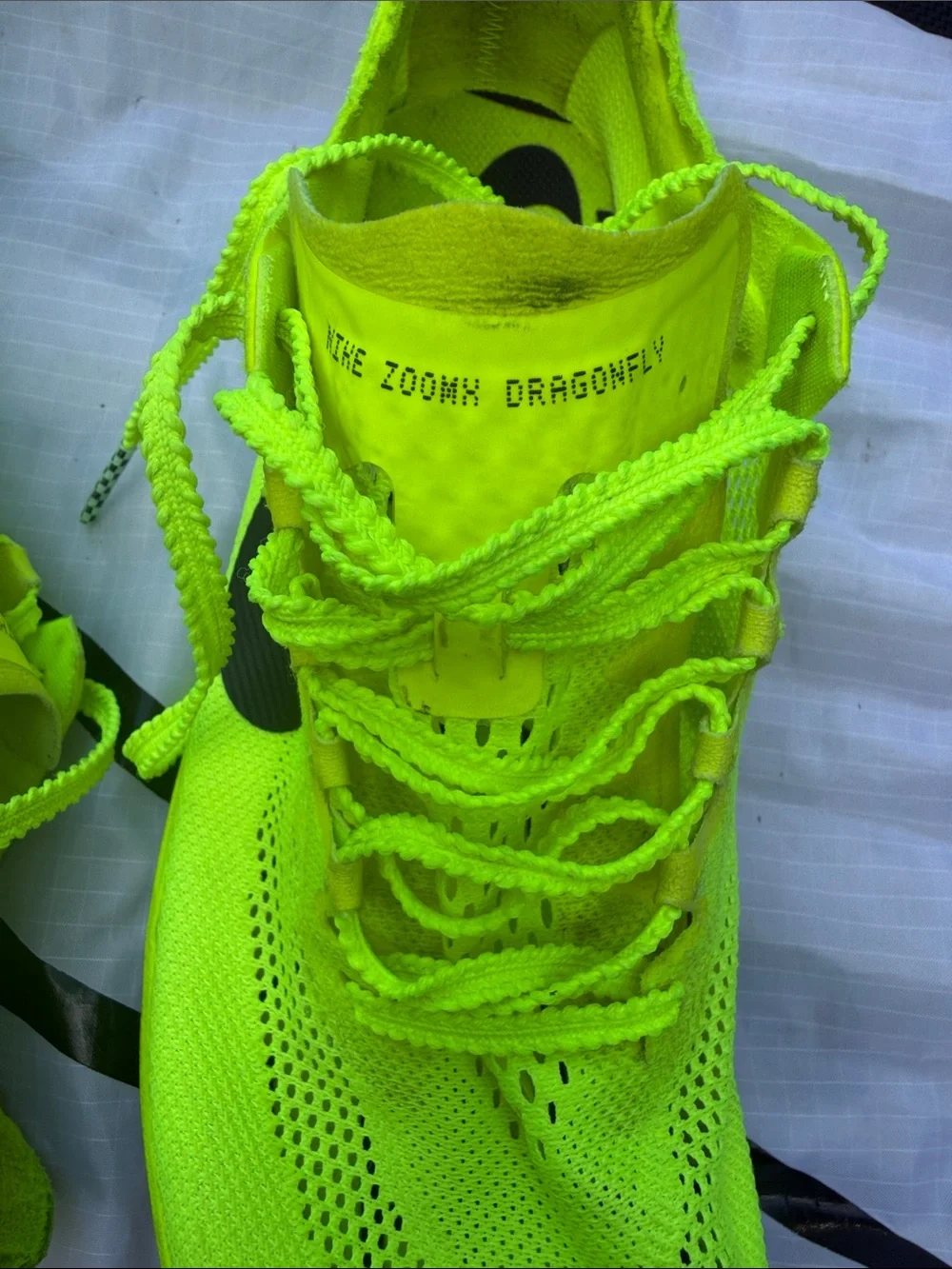 Nike Bright spikes, come with shoes bag